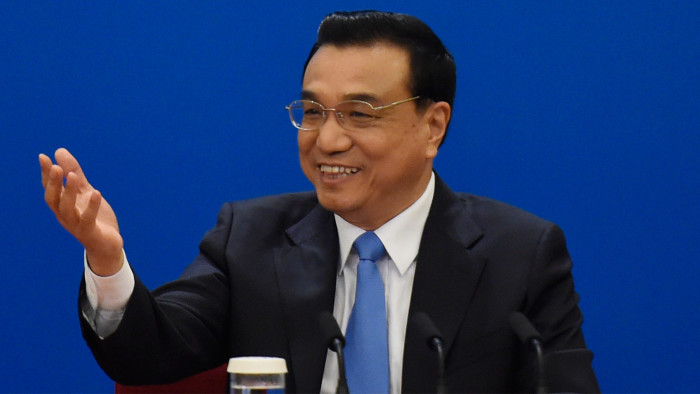 Chinese Premier Li Keqiang speaks during a press conference after the closing ceremony of the annual session of China's legislature, the National People's Congress, in Beijing's Great Hall of the People on March 15, 2015. China's Communist Party-controlled legislature, the National People's Congress (NPC), gathers in the capital for the annual show of political theater, with the &quot;rule of law&quot; high on the agenda. AFP PHOTO / FRED DUFOUR