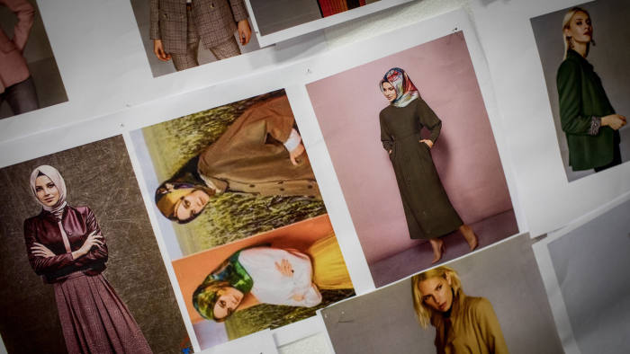 ISTANBUL, TURKEY - NOVEMBER 28: Posters showing looks and poses are pinned to a wall in the photo studio of modest clothing brand Modanisa on November 28, 2017 in Istanbul, Turkey. Modest fashion and Halal business is booming in Turkey. Halal business in Turkey is expected to be worth 3.7 Trillion by 2019. With the introduction of online shopping the industry has seen massive growth. One of Turkey's largest modest clothing companies Modanisa started it's online business in 2011 and has seen sales double every year, it now sells to 120 countries, stocks more than 300 brands and has more than 100million shoppers visit their website each year. Modanisa was also a driving force behind the first ever Modest Fashion Week, held in Istanbul in 2016 and has since expanded to include London and Dubai. Interest in modest fashion is also expanding in western countries Modanisa figures show strong sales in Germany, France and England. Major brands such as Nike and H&M have also created lines catering toward Muslim communities. (Photo by Chris McGrath/Getty Images)