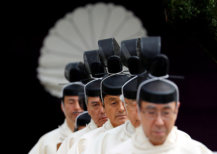 Japanese Shinto priests attend a ritual during an autumn festival at Yasukuni Shrine in Tokyo, Japan October 17, 2017. REUTERS/Kim Kyung-Hoon TPX IMAGES OF THE DAY
