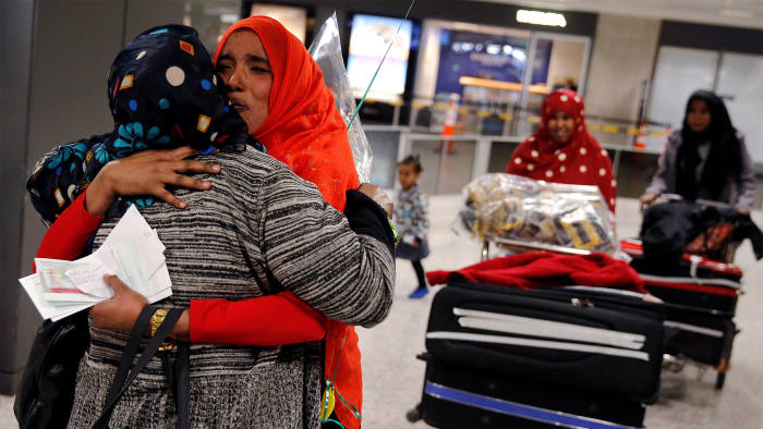 Najmia Abdishakur (2nd L), a Somali national who was delayed entry to the U.S. because of the recent travel ban, is greeted by her mother Zahra Warsma (L) at Washington Dulles International Airport in Chantilly, Virginia, U.S. February 6, 2017.  REUTERS/Jonathan Ernst