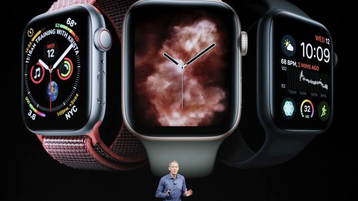 FILE - In this Sept. 12, 2018, file photo, Jeff Williams, Apple's chief operating officer, speaks about the Apple Watch Series 4 at the Steve Jobs Theater during an event to announce new Apple products in Cupertino, Calif. The latest software update to the newest Apple Watch, the Series 4, will now let people take EKGs of their heart and notify them when they have an irregular heartbeat. (AP Photo/Marcio Jose Sanchez, File)