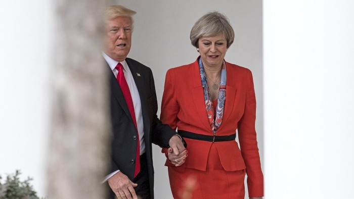WASHINGTON, DC - JANUARY 27: British Prime Minister Theresa May and U.S. President Donald Trump walk along The Colonnade of the West Wing at The White House on January 27, 2017 in Washington, DC. British Prime Minister Theresa May is on a two-day visit to the United States and will be the first world leader to meet with President Donald Trump. (Photo by Christopher Furlong/Getty Images)