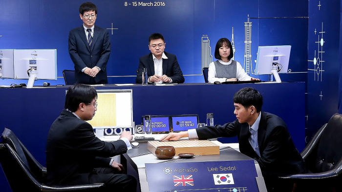 SEOUL, SOUTH KOREA - MARCH 09: In this handout image provided by Google, South Korean professional Go player Lee Se-Dol (R) puts the first stone against Google's artificial intelligence program, AlphaGo, during the Google DeepMind Challenge Match on March 9, 2016 in Seoul, South Korea. Lee Se-dol played a five-game match against a computer program developed by a Google, AlphaGo. (Photo by Google via Getty Images)