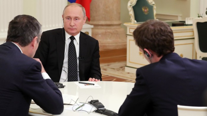 Financial Times interview with Vladimir Putin in Moscow on Wednesday 26th June 2019 - credit is Press-office of the President of Russia - picture shows Lionel Barber, Vladimir Putin and Henry Foy