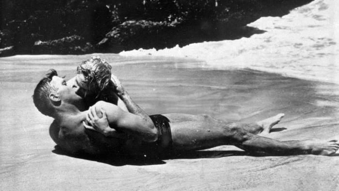 **FILE**Burt Lancaster kisses Deborah Kerr passionately in a beach scene int he 1953 film "From Here To Eternity." Kerr, who shared one of cinema's most famous kisses, has died in Suffolk, eastern England, her agent said Thursday, Oct. 18, 2007. She was 86.(AP Photo/Columbia Pictures)