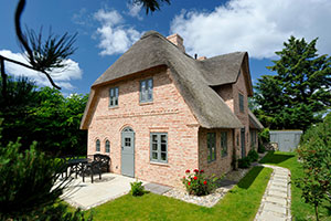 Four-bedroom, thatched house