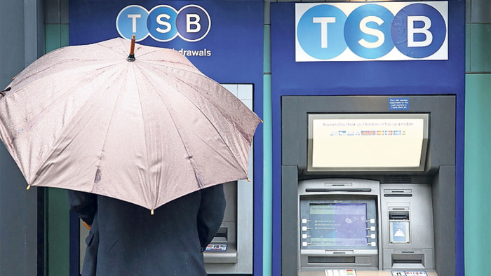 Man withdrawing money from a TSB atm