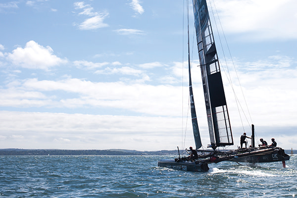 Sir Ben Ainslie and his team practise on one of their test boats on the Solent, ahead of the Portsmouth races on July 23 and 24