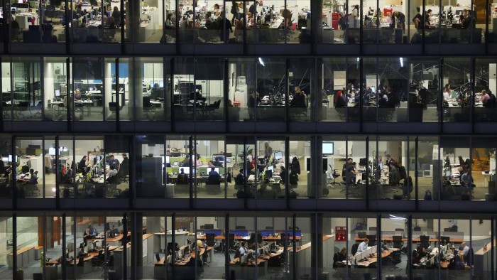 LONDON, ENGLAND - JANUARY 16: Office workers for IPC Media work into the night in the Blue Fin Building in Southwark on January 16, 2013 in London, England. (Photo by Oli Scarff/Getty Images)