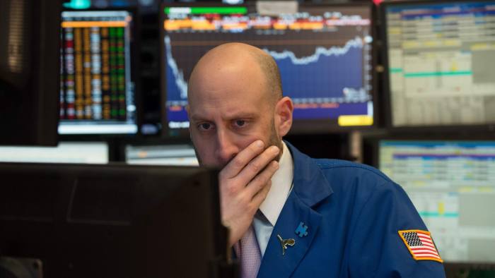 A trader works on the floor before the closing bell of the Dow Jones at the New York Stock Exchange on March 21, 2017 in New York. 
Wall Street stocks fell sharply amid increasing doubts about the prospects for President Donald Trump's agenda, especially ahead of a key congressional vote on health care in two days. / AFP PHOTO / Bryan R. SmithBRYAN R. SMITH/AFP/Getty Images
