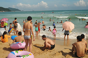 Tourists in Sanya, Hainan, also home to one of China’s naval bases