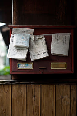 Mail left uncollected at an abandoned home