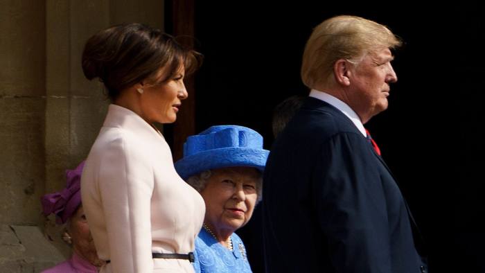 Britain's Queen Elizabeth II escorts US President Donald Trump and US First Lady Melania Trump into Windsor Castle in Windsor, west of London, on July 13, 2018 on the second day of Trump's UK visit.
Queen Elizabeth II welcomed US President Donald Trump for tea at Windsor Castle on Friday -- a meeting which many Britons find the toughest part of his already contentious trip to swallow. / AFP PHOTO / Brendan SmialowskiBRENDAN SMIALOWSKI/AFP/Getty Images