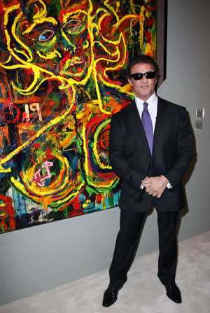 Stallone in 2009 with one of his paintings