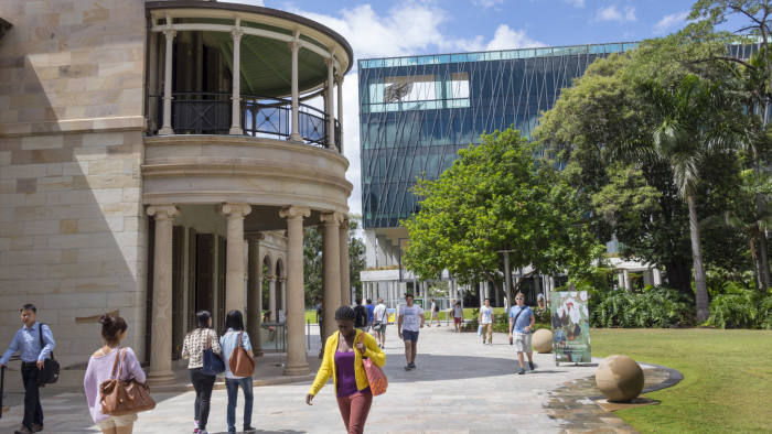 Australia, Queensland, Brisbane Central Business District, QUT Queensland University of Technology Garden Point campus student walking Black woman Old Government House Student Centre Science and Engineering. (Photo by: Jeff Greenberg/Universal Images Group via Getty Images)