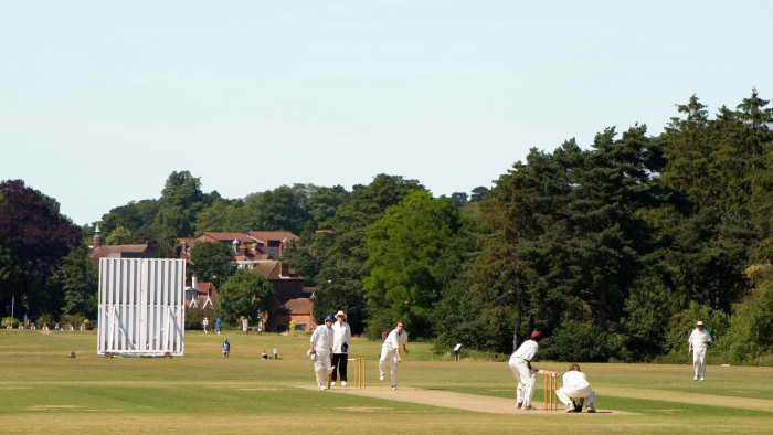 A cricket match taking place near Harpenden