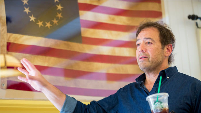 Joel Babbit and a flag dating from 1876, made to honour the original 13-star flag of America