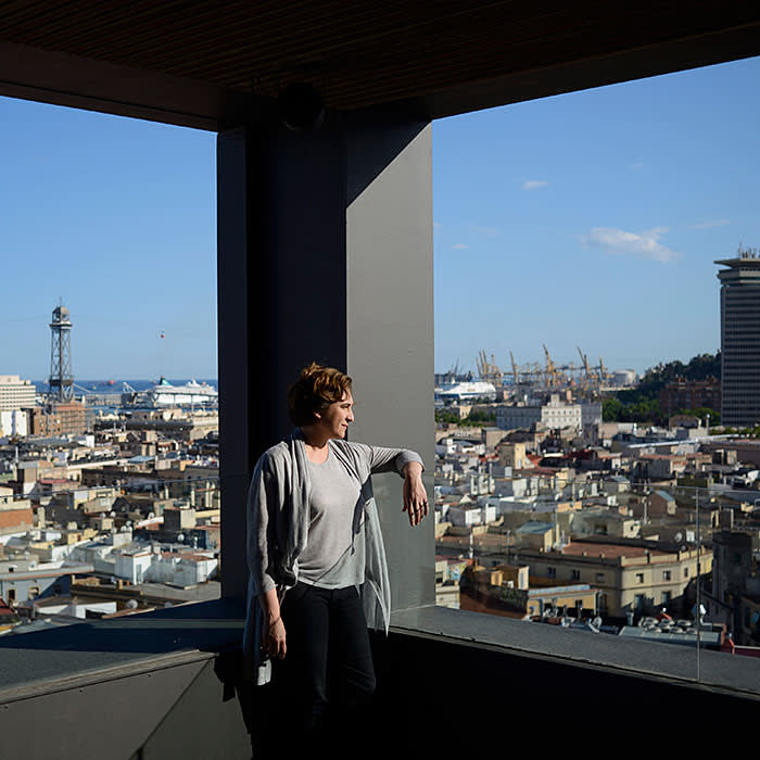 Mayor Ada Colau looks out from a municipal building over Barcelona, Spain, May 30, 2016