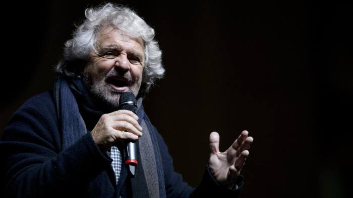PIAZZA SAN CARLO, TURIN, ITALY - 2016/12/02: Beppe Grillo, founder of the Movimento 5 Stelle (Five Star Movement), speaks during a demonstration to support the 'No' to the constitutional referendum. Italians will be called on December 4 to vote in a referendum proposed by government, on the reform of the Constitution adopted in 1947. (Photo by Nicolò Campo/LightRocket via Getty Images)