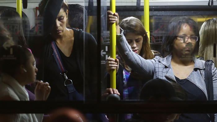 Commuters stand on a crowded bus during a tangled evening commute on June 9, 2014 in Sao Paulo, Brazil. (Photo by Mario Tama/Getty Images)