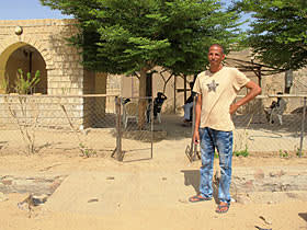 Almoubareck Ag Yehia, a Tuareg, outside his ransacked restaurant