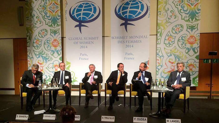 a panel made up of men at the Global Summit of Women