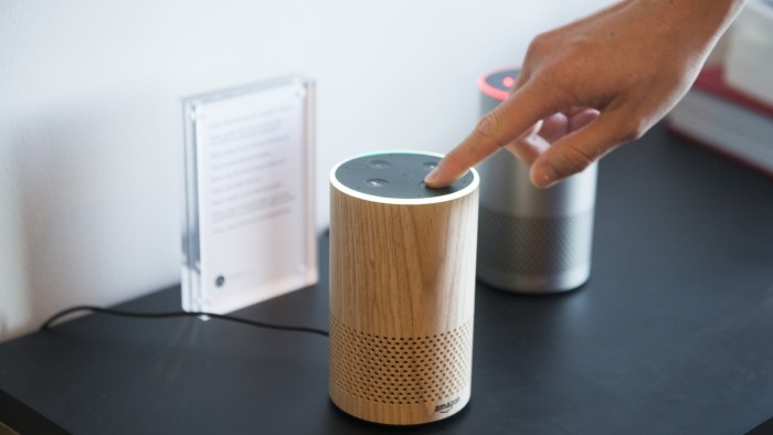 An attendee operates the new Amazon.com Inc. Echo device on display during the company's product reveal launch event in downtown Seattle, Washington, U.S., on Wednesday, Sept. 27, 2017. Amazon unveiled a smaller, cheaper version of its popular Alexa-powered Echo speaker that the e-commerce giant said has better sound. Photographer: Daniel Berman/Bloomberg