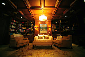 The wood-panelled library