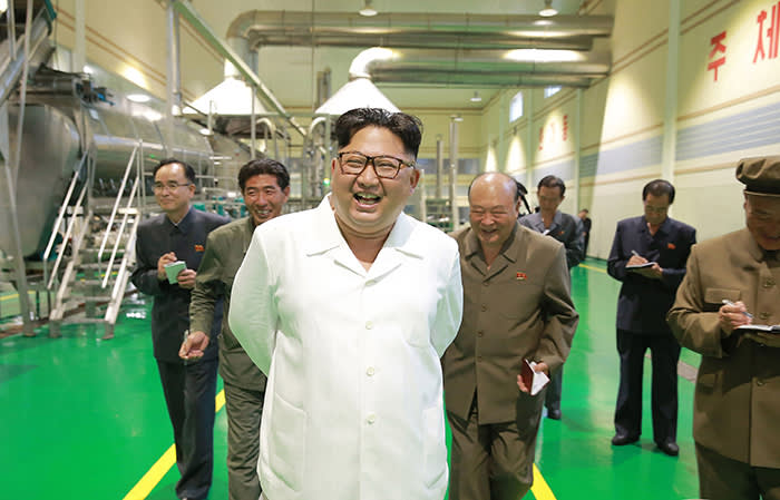 In this undated photo provided on July 10, 2018, by the North Korean government, North Korean leader Kim Jong Un, center, visits a potato farina production factory in Samjiyon County, North Korea. Independent journalists were not given access to cover the event depicted in this image distributed by the North Korean government. The content of this image is as provided and cannot be independently verified. Korean language watermark on image as provided by source reads: "KCNA" which is the abbreviation for Korean Central News Agency. (Korean Central News Agency/Korea News Service via AP)