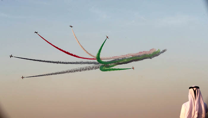 TOPSHOT - UAE's Al-Fursan display team perform during the Dubai Airshow on November 14, 2017, in the United Arab Emirates. / AFP PHOTO / KARIM SAHIBKARIM SAHIB/AFP/Getty Images