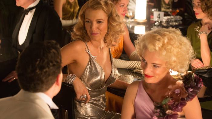 From left, Jesse Eisenberg (foreground), Blake Lively and Parker Posey in ‘Café Society’