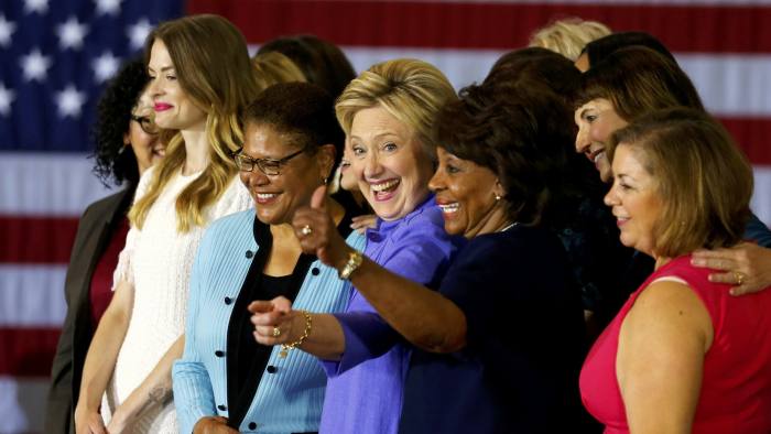 U.S. Democratic presidential candidate Hillary Clinton poses for a group picture on stage during an appearance at a "Women for Hillary" event in Culver City, California, United States, June 3, 2016. REUTERS/Mike Blake/File Photo