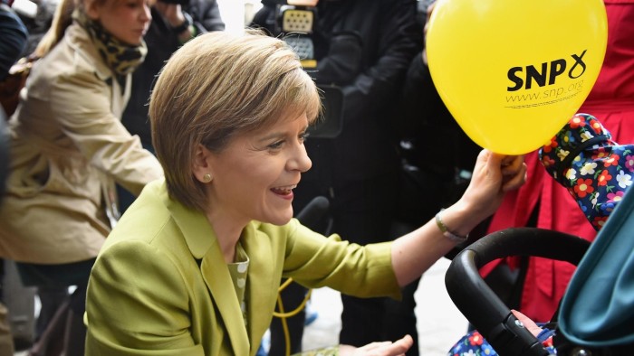 EDINBURGH, SCOTLAND - APRIL 03: First Minister Nicola Sturgeon greets supporters on the campaign trail on April 4, 2015 in Edinburgh, Scotland. SNP Leader Nicola Sturgeon, today set out how the SNPs anti austerity plan would see an additional £9.5bn funding boost for the NHS across the UK the SNP claimed that both Labour and the Cnservatives are both committed to a further £30bn of austerity. (Photo by Jeff J Mitchell/Getty Images)