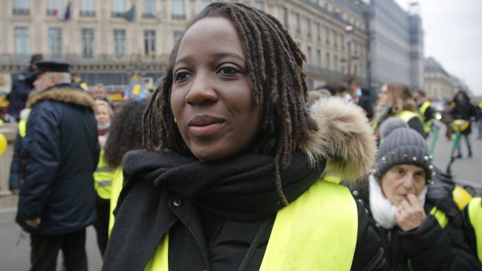 Priscillia Ludosky one of the leader of the yellow vests movement march during a protest in Paris, Sunday, Jan. 6, 2019. Several hundred women wearing yellow vests march during a rally in Paris to give a different image to the movement. (AP Photo//Michel Euler)