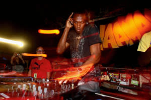 Bolt celebrating with a DJ set after his victories