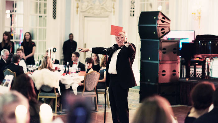 Jeffrey Archer starts the bidding at the British Heart Foundation auction at the Savoy