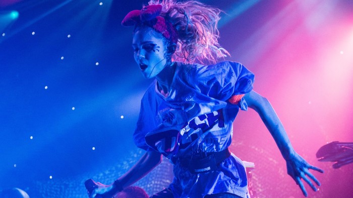Grimes on stage at the Brixton Academy. Photo: Xposurephotos.com