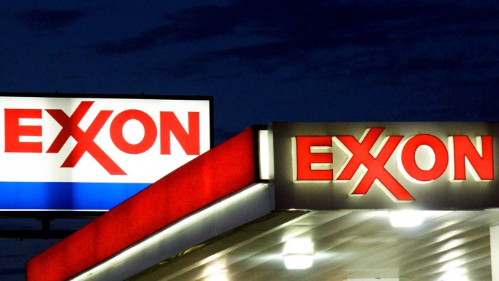 (FILES) An Exxon sign is seen at a station in this September 20, 2008 file photo in Manassas, Virginia. The United States on July 20, 2017 hit oil giant ExxonMobil with a $2 million fine for violating Ukraine-related sanctions at a time when Secretary of State Rex Tillerson was still in charge of the company. The Treasury Department said Exxon had business dealings with Igor Sechin, president of Russian state energy company Rosneft, who was blacklisted under the sanctions imposed in the wake of the Russian annexation of Crimea. / AFP PHOTO / AFP FILES / KAREN BLEIERKAREN BLEIER/AFP/Getty Images