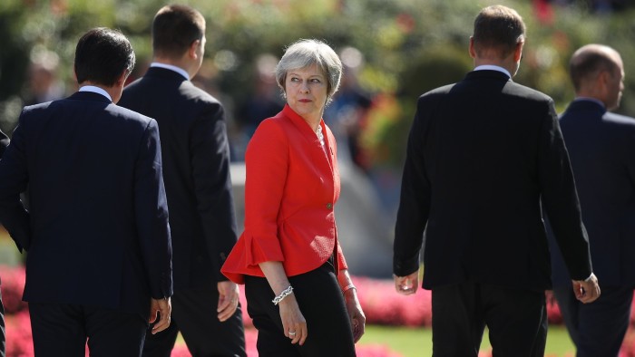 SALZBURG, AUSTRIA - SEPTEMBER 20: British Prime Minister Theresa May looks back as she and other leaders depart following the family photo on the second day of an informal summit of leaders of the European Union on September 20, 2018 in Salzburg, Austria. High on the agenda of the two-day summit is migration policy. (Photo by Sean Gallup/Getty Images) *** BESTPIX ***