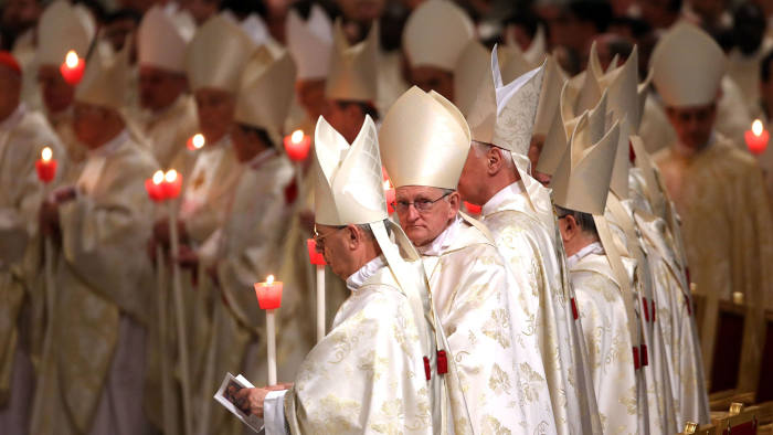 Cardinals attend the Easter vigil mass given by Pope Francis at St Peter’s Basilica in Vatican City