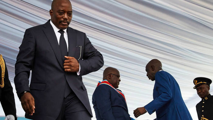 Mandatory Credit: Photo by HUGH KINSELLA CUNNINGHAM/EPA-EFE/REX/Shutterstock (10072365d)
DR Congo's outgoing President Joseph Kabila (L) walks off as the new President Felix Tshisekedi (2-R) remains on the stage during the inauguration ceremony at the Palais de Nation in Kinshasa, the Democratic Republic of the Congo, 24 January 2019. Tshisekedi, the son of the country's veteran opposition leader, was sworn-in as the country's new President after disputed elections.
Felix Tshisekedi sworn in as DR Congo's President, Kinshasa, Congo, The Democratic Republic Of The - 24 Jan 2019