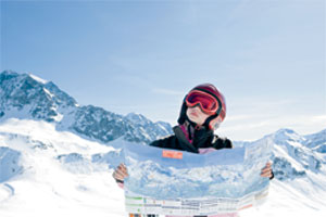 A skier holding a map