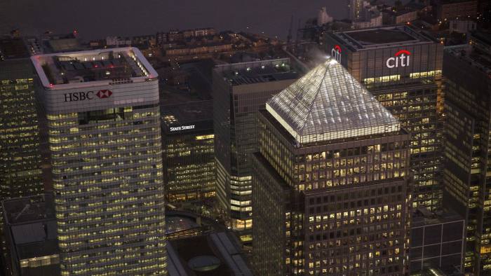 Aerials Views Of The Canary Wharf Business District And The City Of London...No. 1 Canada Square stands surrounded by the offices of global financial institutions, including HSBC Holdings Plc, Citigroup Inc., and State Street Corp., in this aerial photograph of Canary Wharf business and shopping district in London, U.K., on Monday, Dec. 9, 2013. Bank of England Governor Mark Carney said Britain's recovery will need to be sustained for a while before it is strong enough to withstand higher interest rates. Photographer: Matthew Lloyd/Bloomberg