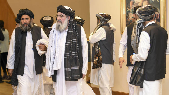 Mandatory Credit: Photo by STRINGER / EPA-EFE / Shutterstock (10570926v) Mullah Abdul Salam Zaeef (L), a senior official of the Afghan Taliban, arrives at the signing of an American-Taliban agreement in Doha, Qatar, February 29, 2020. The United States and the Taliban signed an agreement on February 29 to restore peace to Afghanistan, which paves the way for the withdrawal of American troops and intra-Afghan negotiations. US, Taliban sign peace agreement in Qatar and Doha - February 29, 2020