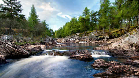 The beautiful Achness Falls, Glen Cassley, Sutherland in Scotland on a bright spring evening