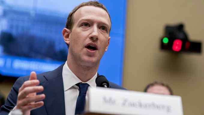 Facebook CEO Mark Zuckerberg testifies before a House Energy and Commerce hearing on Capitol Hill in Washington, Wednesday, April 11, 2018, about the use of Facebook data to target American voters in the 2016 election and data privacy. (AP Photo/Andrew Harnik)
