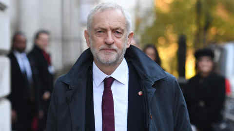Labour leader Jeremy Corbyn walks through Downing Street ahead of the remembrance service at the Cenotaph memorial in Whitehall, central London, on the 100th anniversary of the signing of the Armistice which marked the end of the First World War. PRESS ASSOCIATION Photo. Picture date: Sunday November 11, 2018. See PA story MEMORIAL Armistice. Photo credit should read: Stefan Rousseau/PA Wire