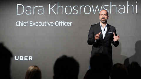 FILE PHOTO: The Chief Executive Officer (CEO) of ride-hailing company Uber, Dara Khosrowshahi, on stage during an event in New York City, New York, U.S., September 5, 2018. REUTERS/Carlo Allegri/File Photo