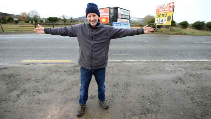 TO GO WITH BREXIT STORY BY WWILLIAM WALLIS DATE: 31 Jan 2019 - Padar MacNamee stands right on the border crossing on the Dublin Road outside Newry, South Armagh, Northern Ireland. Photo/Paul McErlane