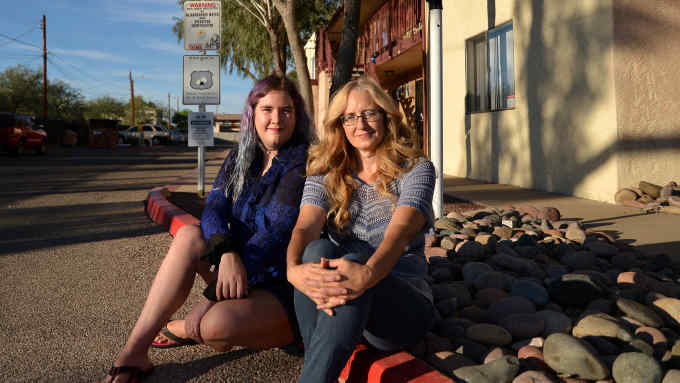 Tucson, Arizona, USA; November 3, 2018; Skye Milam, 28, (left), and her mother, Sherry Tilton, will move from an apartment complex to a Habitat for Humanity home in 2020. The complex is patrolled by a security guard who is armed with a hand gun. Credit: Norma Jean Gargasz